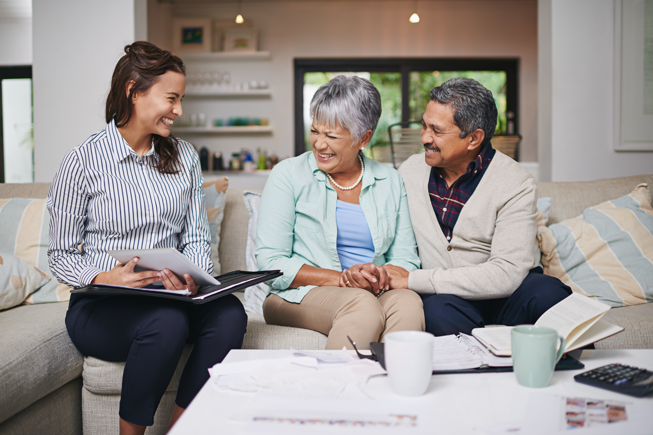Financial Advisor meets with older couple