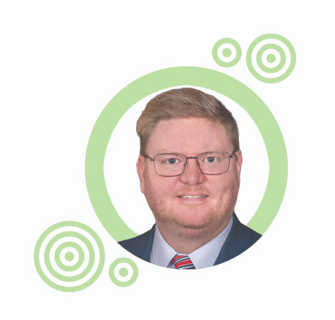 Headshot of Jason Hessler in a green circular shape
